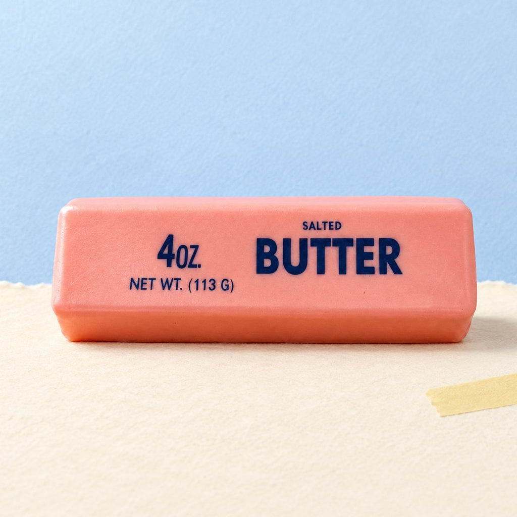Pastell Butter Squishy in Rosa, Erdbeere oder Schokolade, auf Pastellpapier