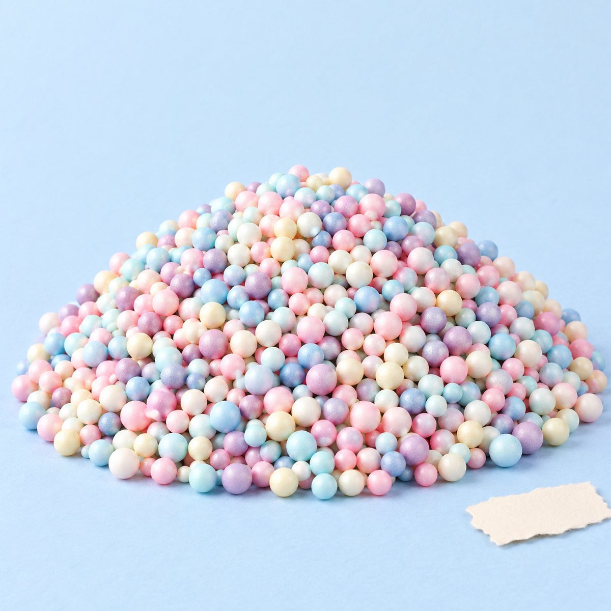 Pastell-Schaumkugeln als Füllung für Papier-Squishys, 100 g, auf Pastellpapier