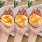 Pineapple bun squishy slow rising (8 cm, golden), squished flat, half risen and fully back in shape