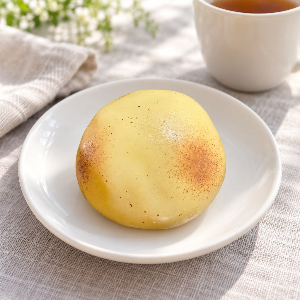 Mouldable Potato Squishy, No Bounce Back, on a plate on a breakfast table