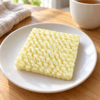Ramen Squishy, Instant Noodle Block, on a plate on a breakfast table