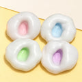 Rice cake squishy set mochi – Mochi Rice Cake Squishy, all 4 flavors, product photo on pastel paper