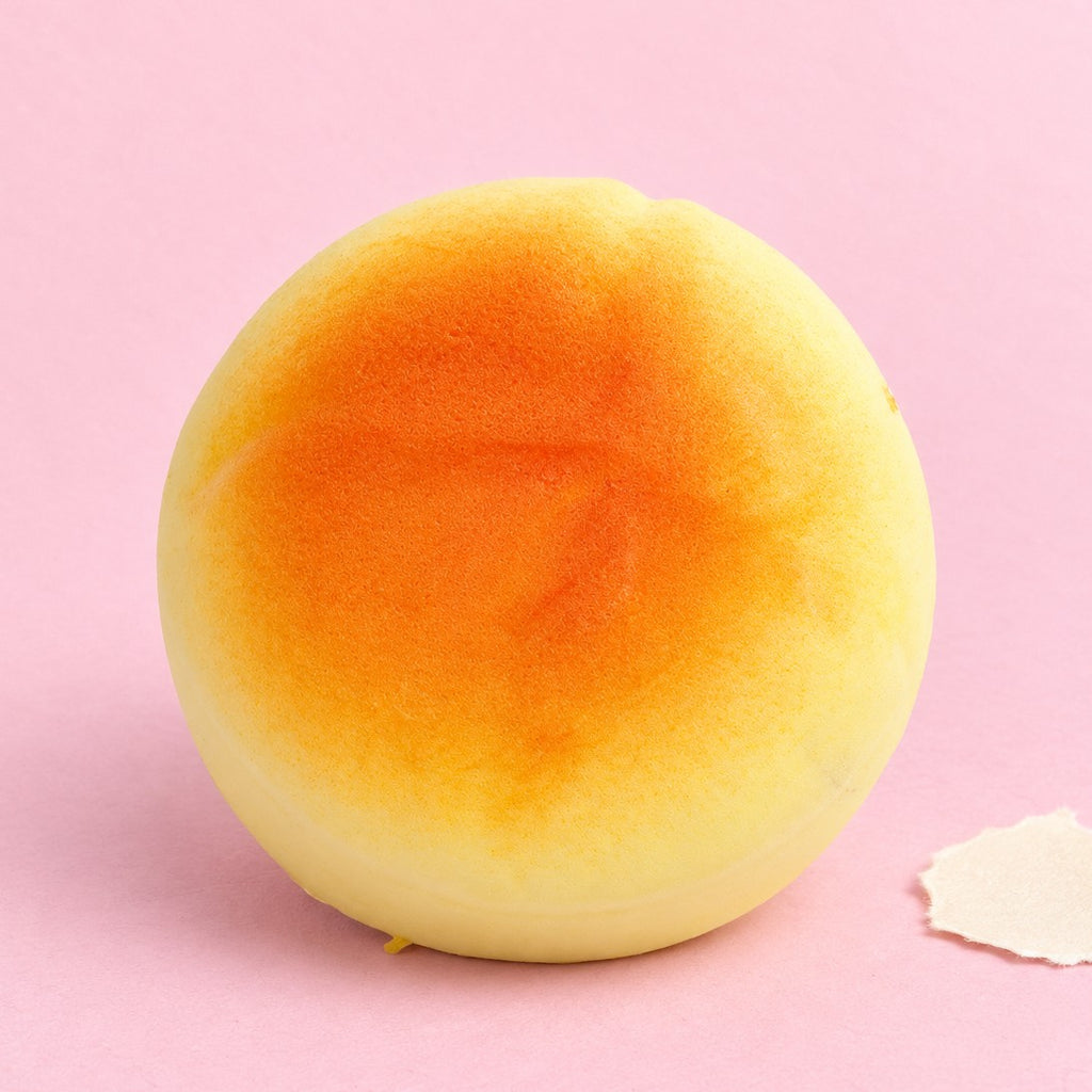 Round bun squishy – Round Bun Squishy, Small Bread Roll 6 cm, product photo on pastel paper