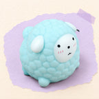 Sheep squishy soft – Sheep Squishy, Fluffy Lamb in Pastel TPR (Blue), product photo on pastel paper