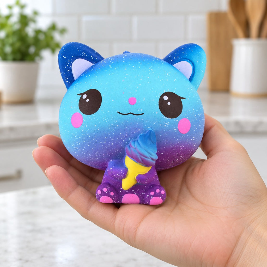 Slow Rising Cat Squishy with Ice Cream, Scented (Motif A: Galaxy Cat), held in a hand to show the real size