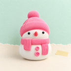 Schneemann squishy weihnachts – Schneemann Squishy, weich wie Mochi (Rosa, im Beutel), Produktfoto auf Pastellpapier