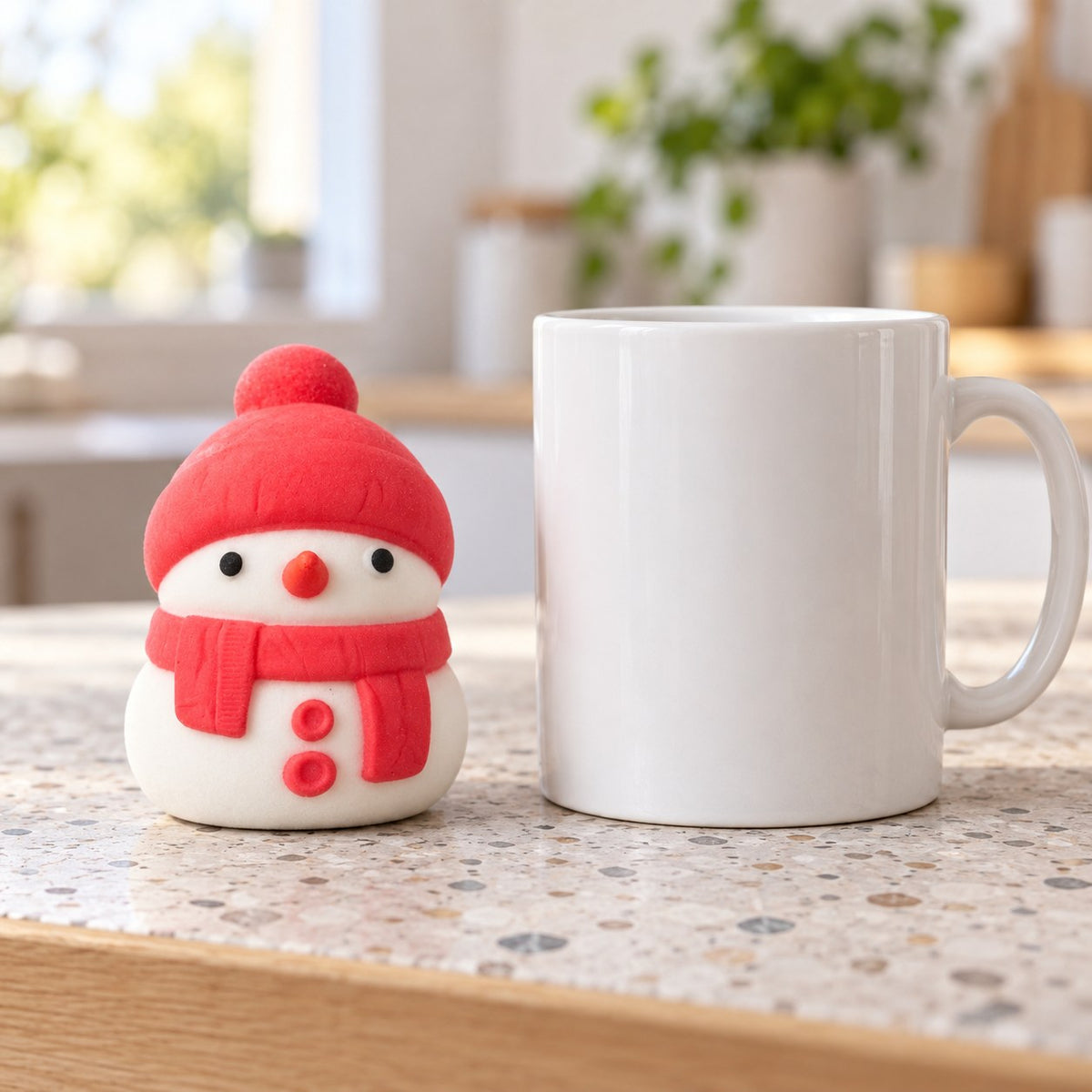 Snowman Squishy, Mochi Soft and Slow Rising (red), next to a coffee mug for size comparison