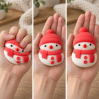 Snowman squishy christmas (red), squished flat, half risen and fully back in shape