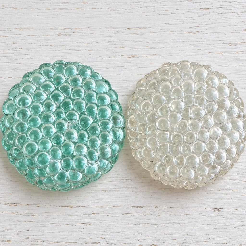 Squishy bulle de verre crunchy, toutes les couleurs posées côte à côte