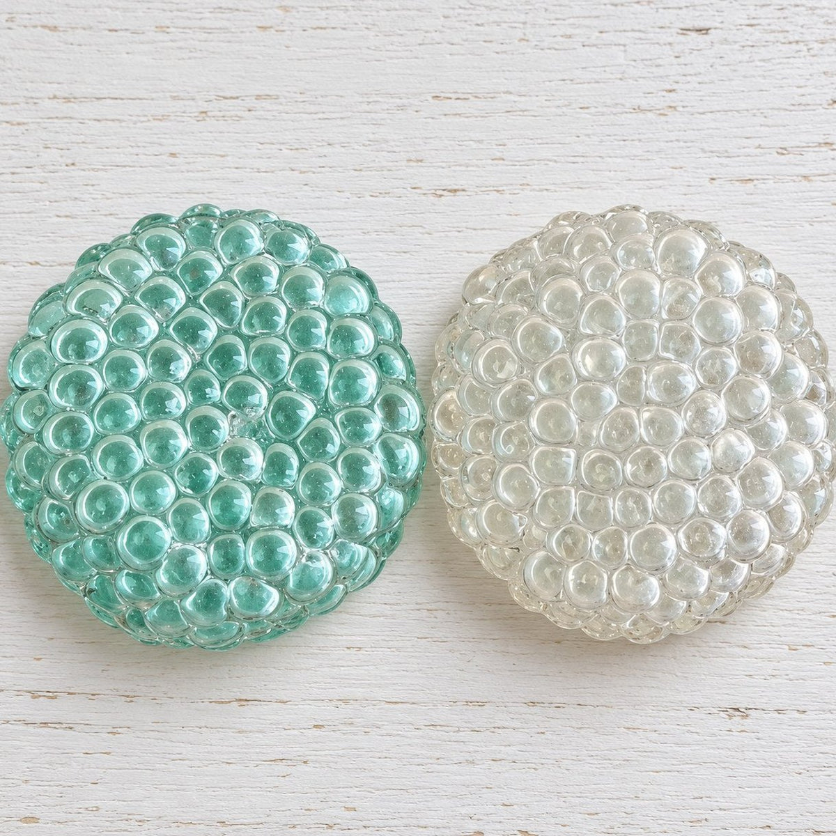 Squishy bulle de verre crunchy, toutes les couleurs posées côte à côte