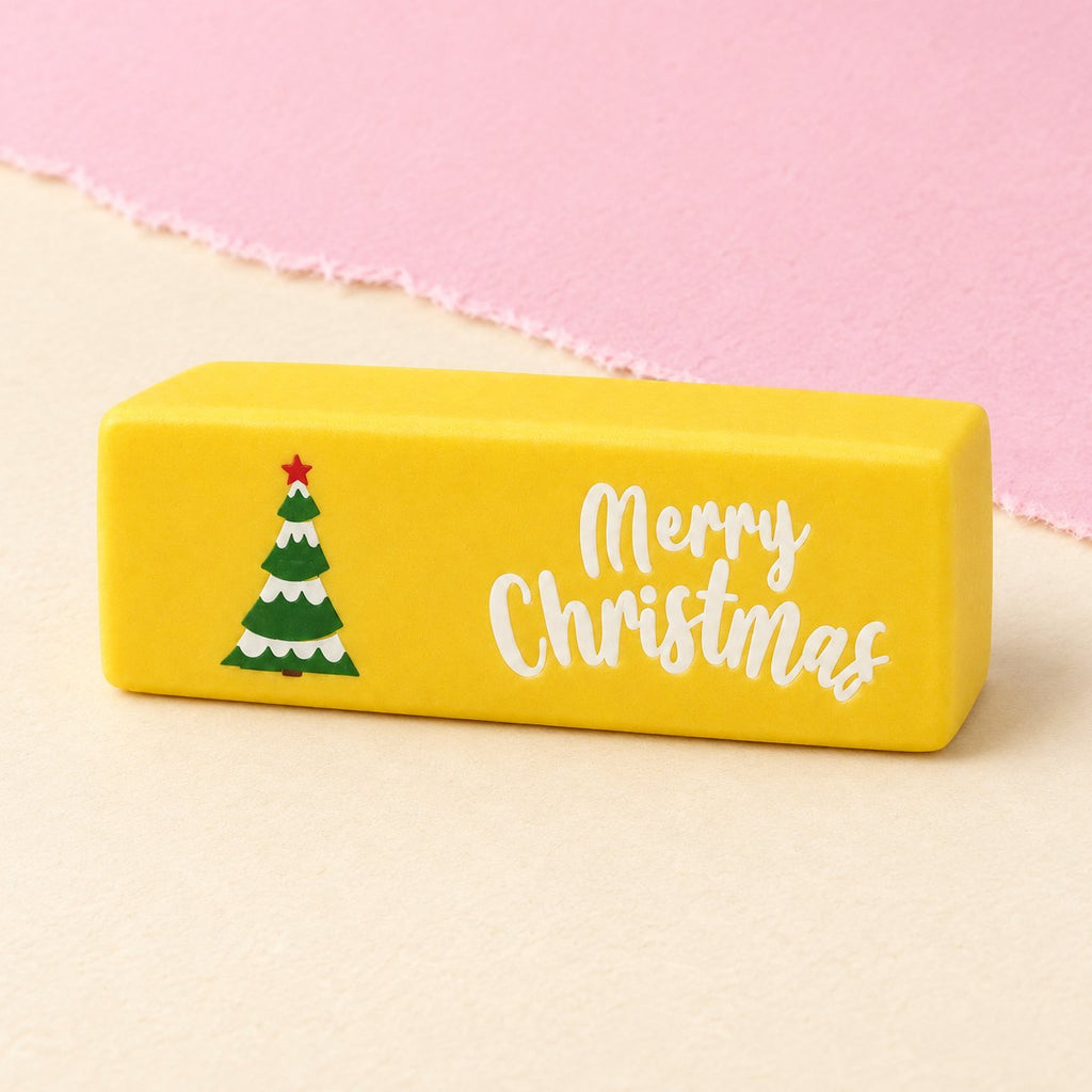 Squishy burro Merry Christmas in 6 colori: giallo con albero di Natale, su carta pastello