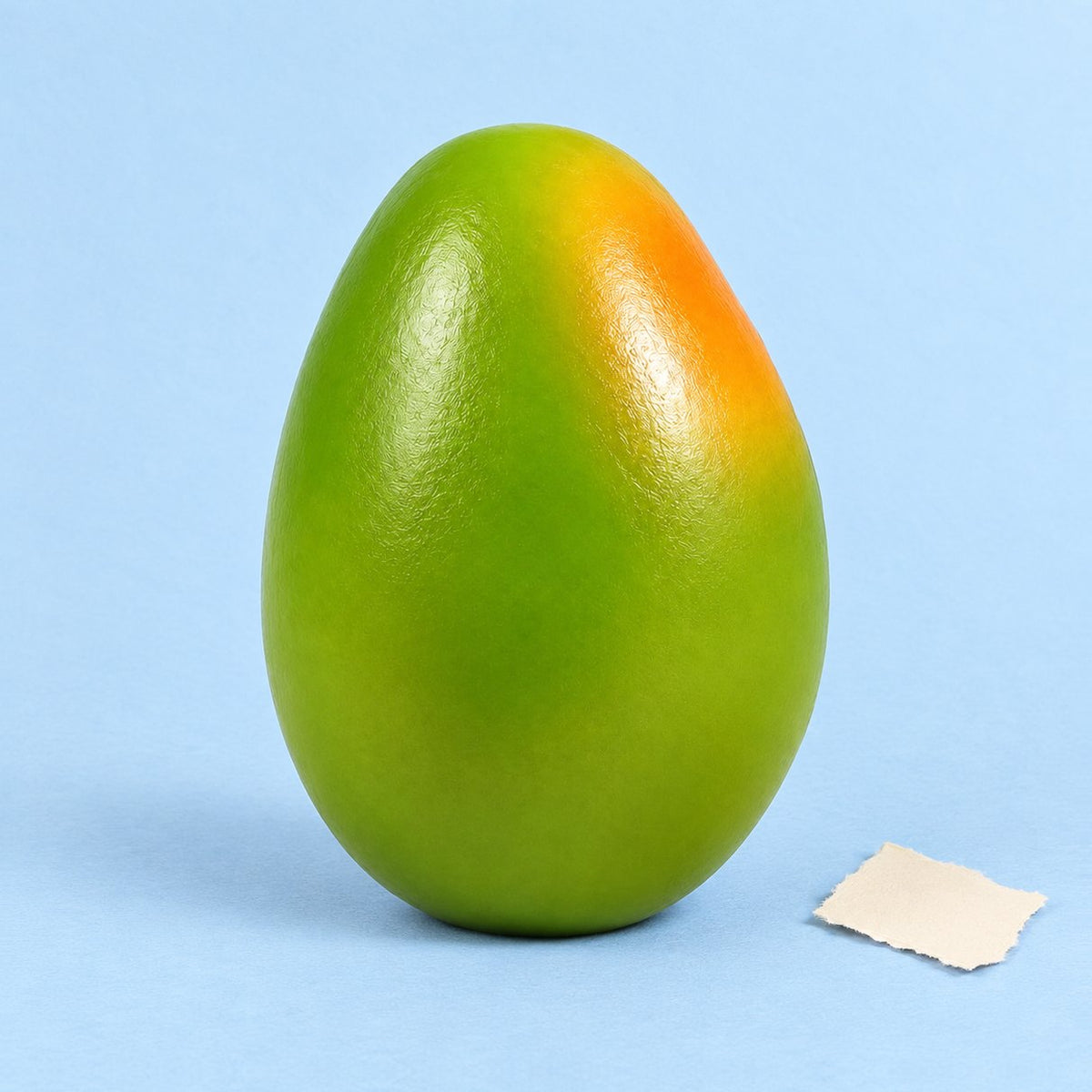 Squishy mango, foto del prodotto su carta pastello