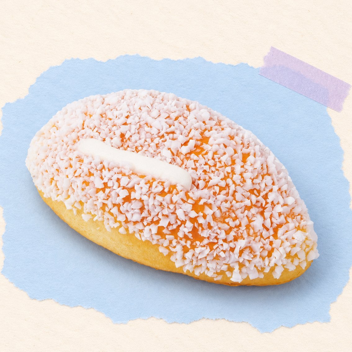 Squishy pãozinho slow rising gigante de creme e coco, 12 cm, sobre papel pastel
