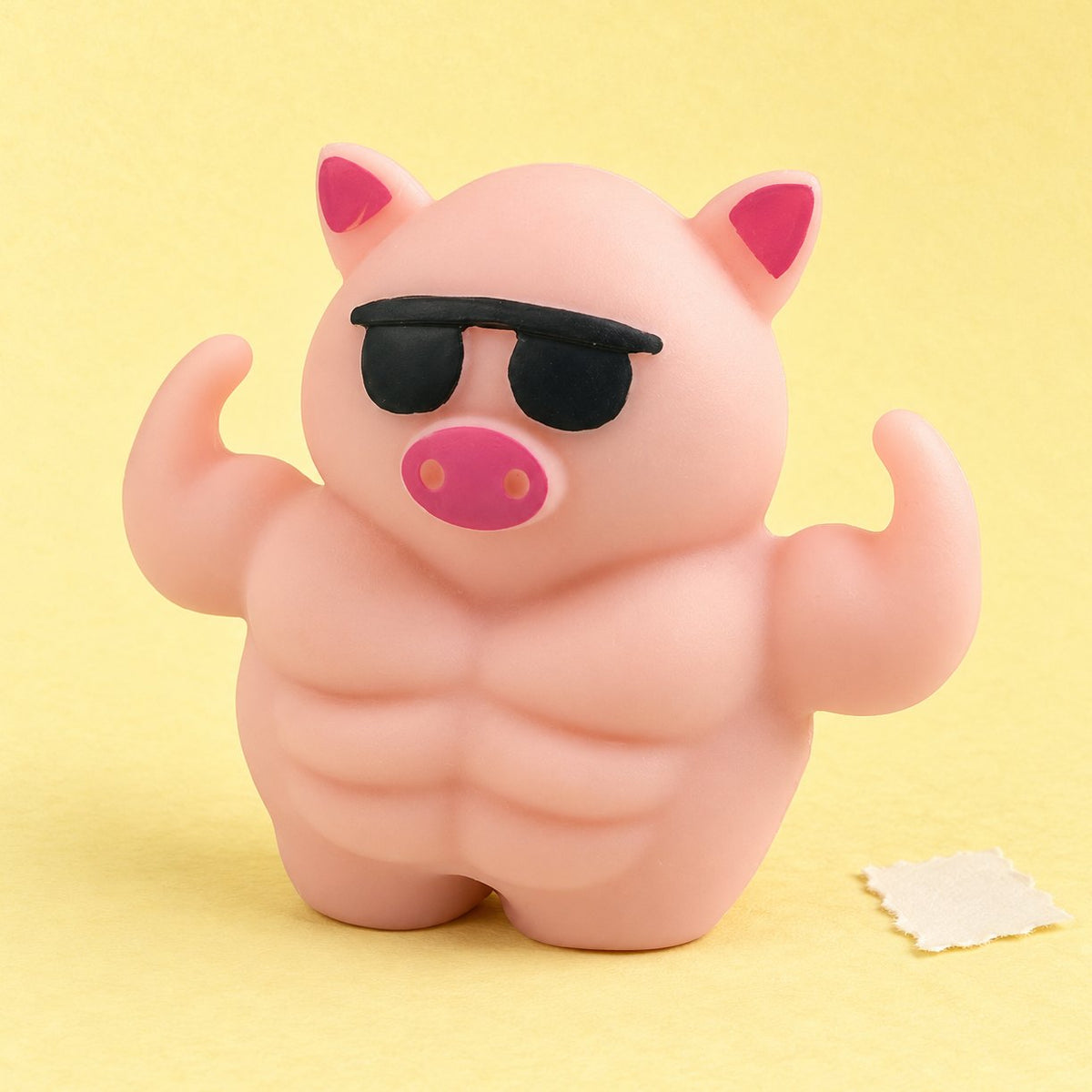 Squishy svalnaté prasátko se slunečními brýlemi, 12,5 cm, na pastelovém papíře