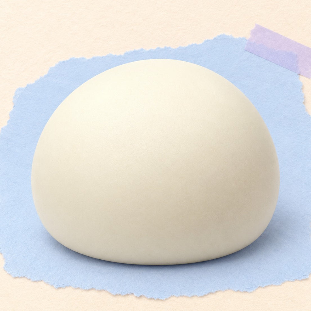 Steamed bun squishy dumpling – Steamed Bun Squishy, Slow Rising PU, 9 cm (White), product photo on pastel paper