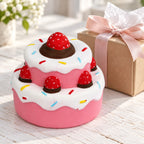 Strawberry cake squishy jumbo, as a small gift next to a wrapped box