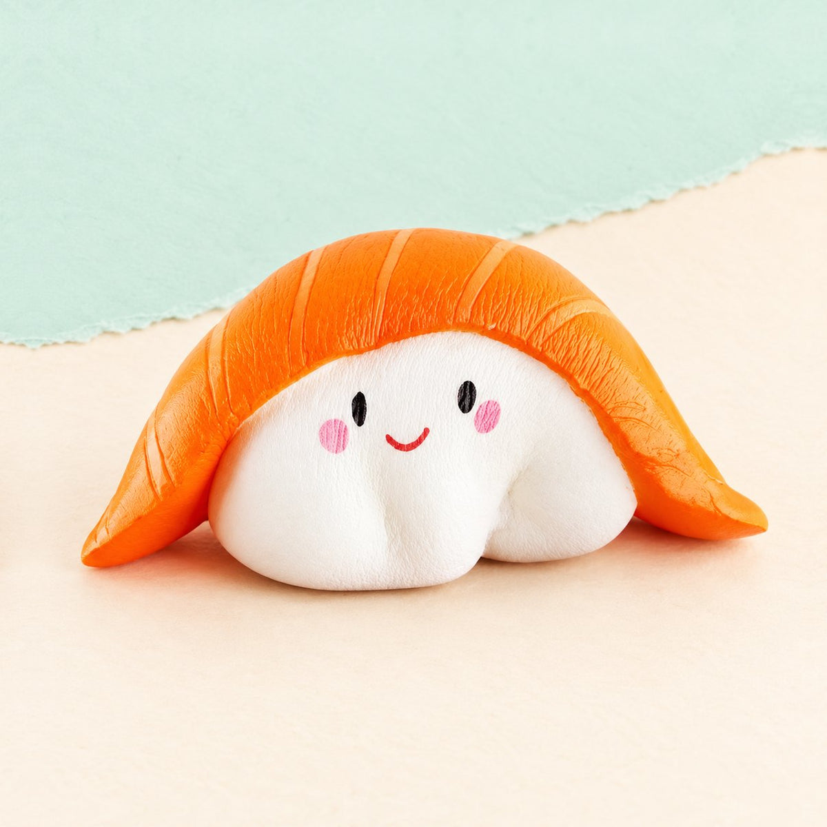 Zachte sushi squishy in de vorm van een kawaii zalm-nigiri