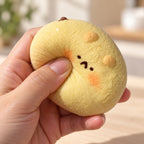 Taba Squishy Hamster Daifuku, Extra Soft (golden), being squeezed by hand, soft and squishy