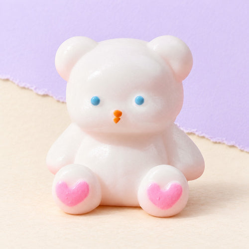Teddy bear squishy white with heart paws – Teddy Bear Squishy, White with Heart Paws, 7 cm, product photo on pastel paper