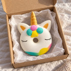 Unicorn squishy, unboxed from a parcel with tissue paper