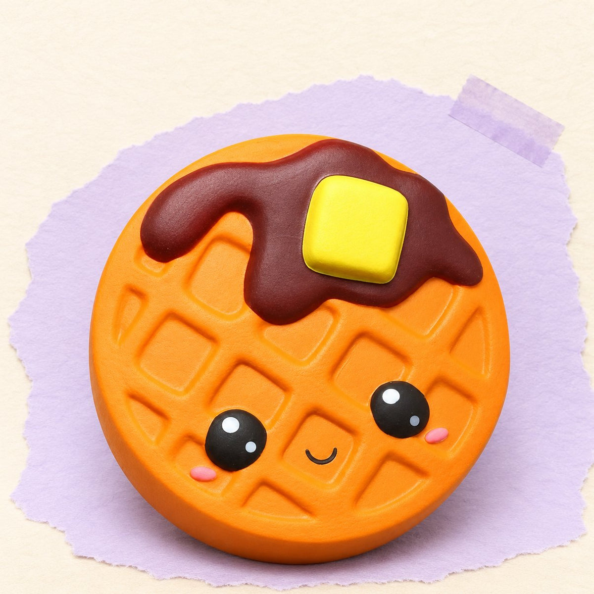 Kawaii wafel squishy op pastelkleurig papier