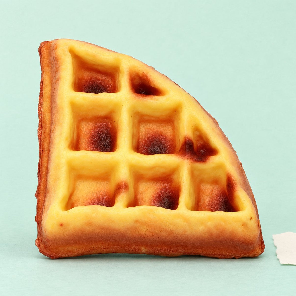 Zachte wafel squishy, realistische wafelpunt van 11 cm op pastelkleurig papier
