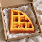 Waffle squishy slow rising, unboxed from a parcel with tissue paper
