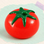 Water squishy fruit ball tomato – Water Squishy Fruit Ball, Tomato, Grape or Lemon, product photo on pastel paper