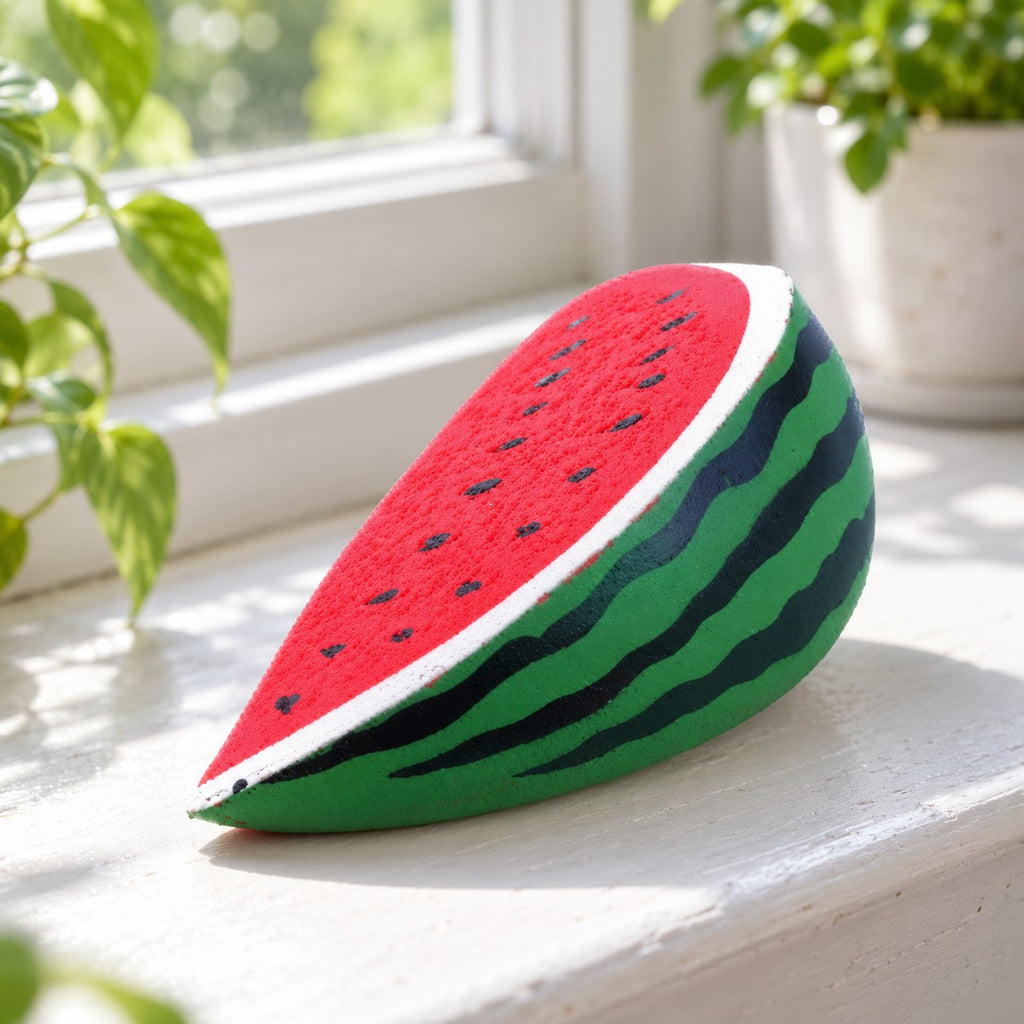 Watermelon squishy slow rising, on a sunny windowsill