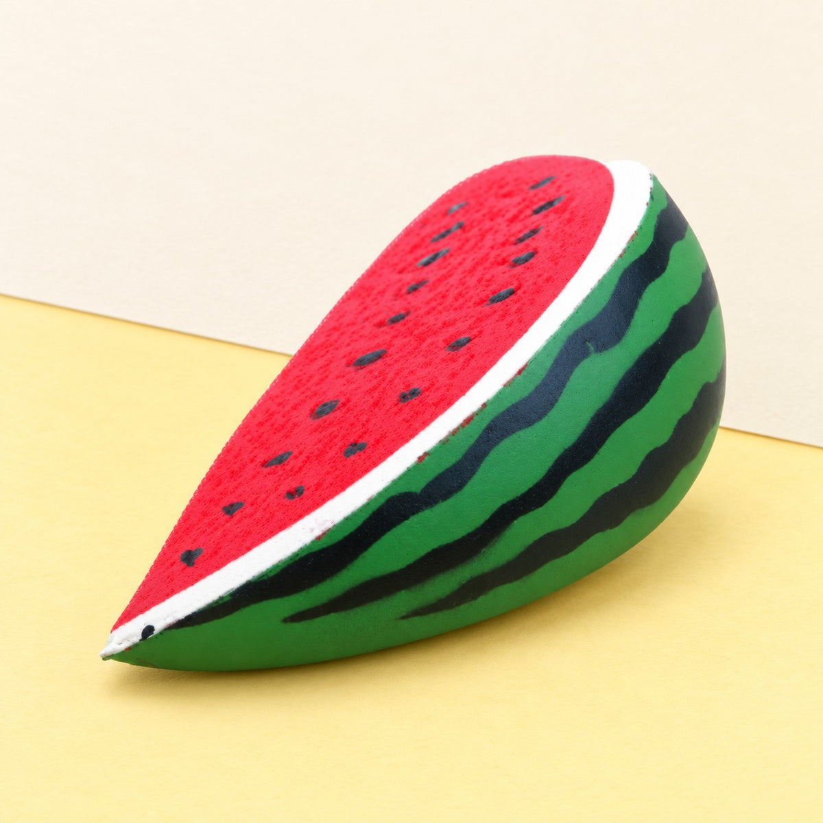 Watermelon squishy slow rising – Watermelon Squishy, Slow Rising PU, product photo on pastel paper