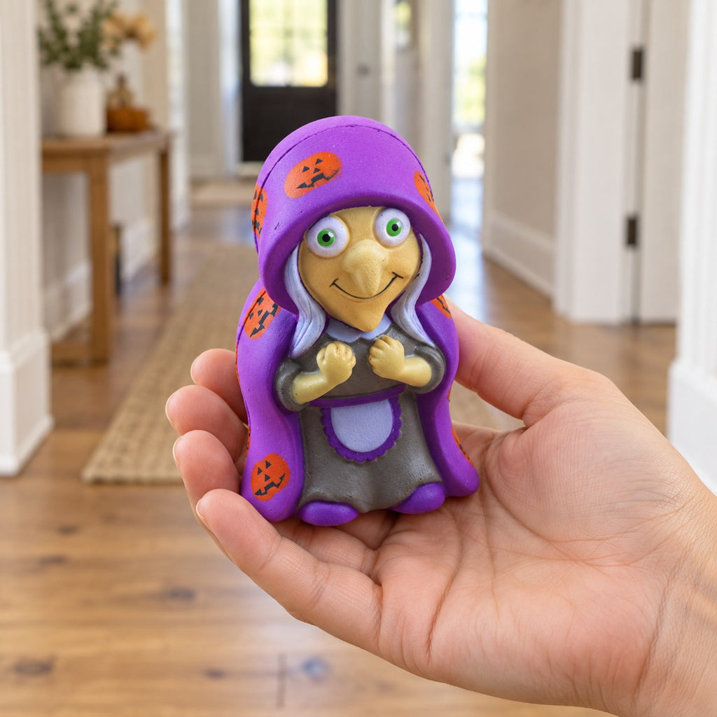 Witch Squishy for Halloween, Slow Rising, held in a hand to show the real size