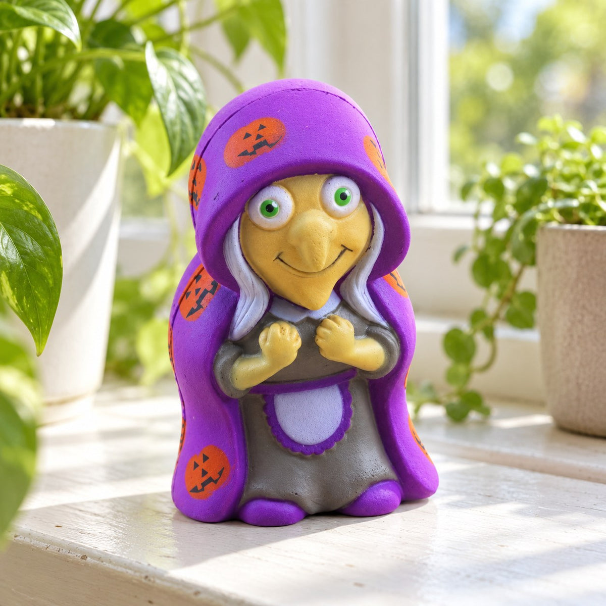 Witch Squishy for Halloween, Slow Rising, on a sunny windowsill